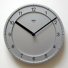 A clock with a fast-moving second hand.
